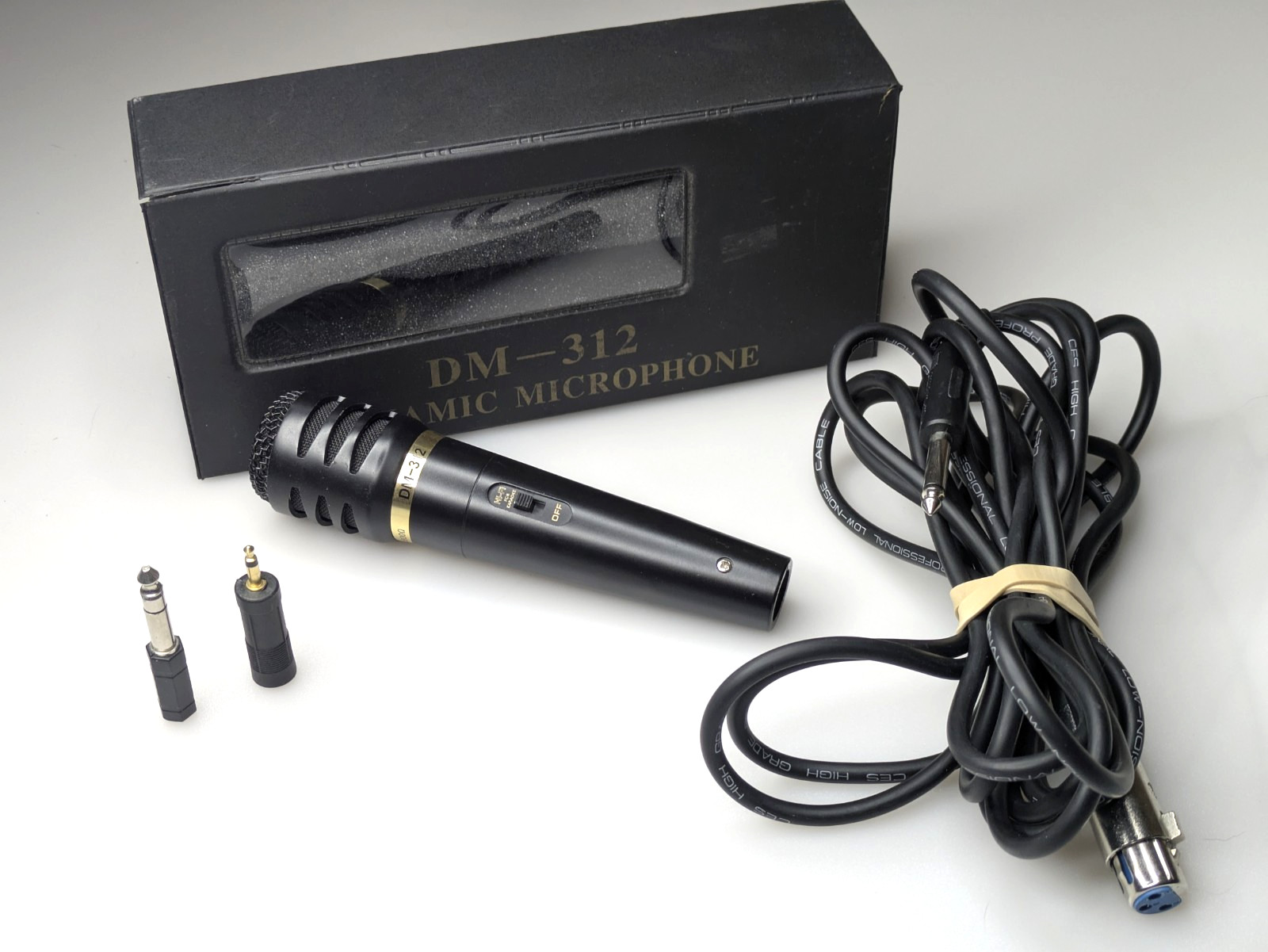 DM-312 Dynamic Microphone with Hi-fi Karaoke Switch with cable and Box.
