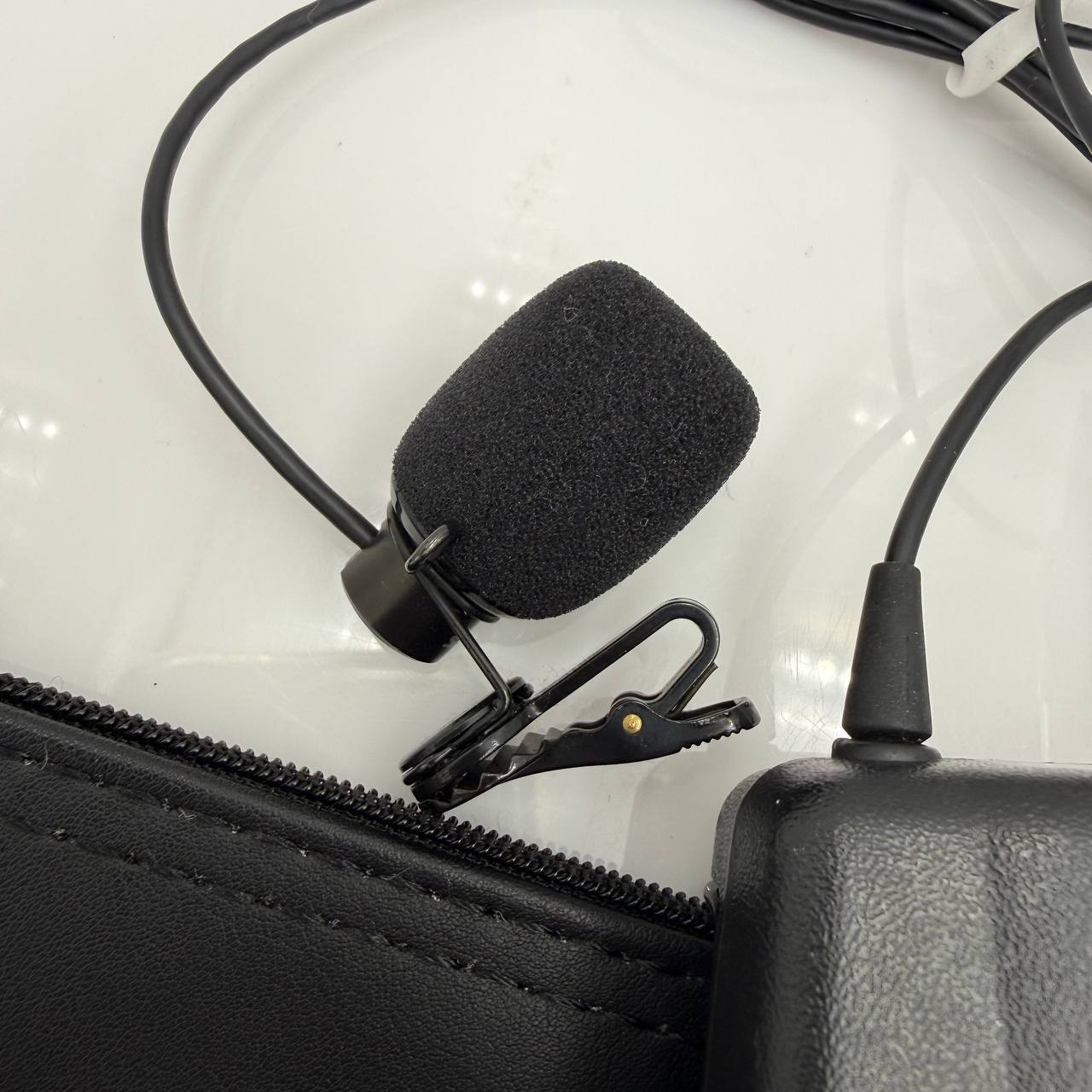 Shure ULX1-J1 Wireless Bodypack Transmitter w Lavalier Mic & Pouch 554-590MHz