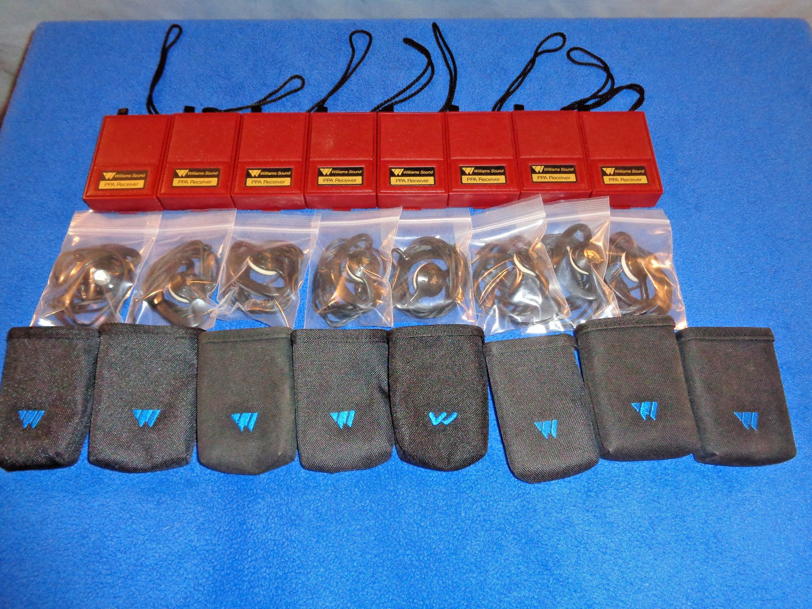 Lot of 8 Williams Sound R7-4 Receivers w/ Earspeakers and Holsters