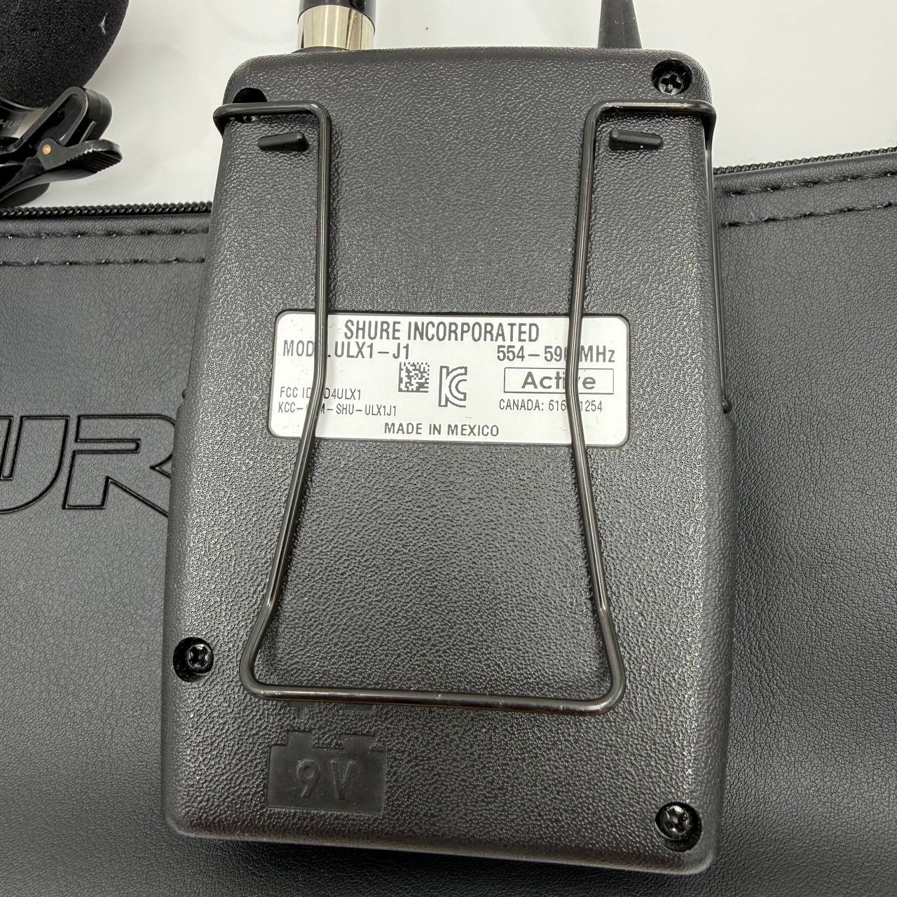 Shure ULX1-J1 Wireless Bodypack Transmitter w Lavalier Mic & Pouch 554-590MHz