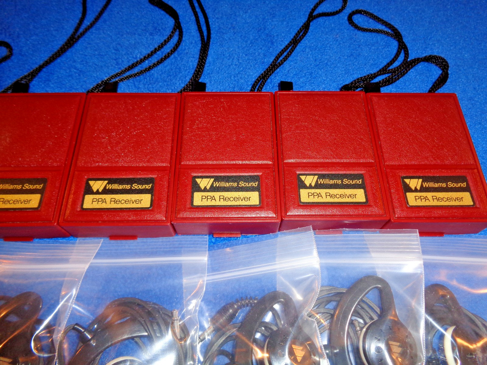 Lot of 8 Williams Sound R7-4 Receivers w/ Earspeakers and Holsters